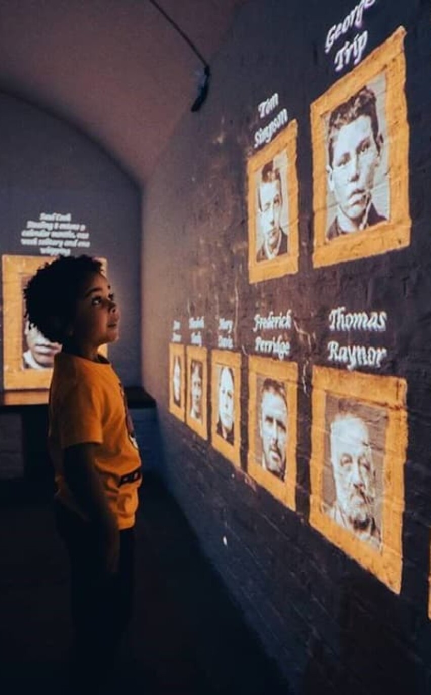 History Whisperer interactive XR museum experience child prisoners faces coming to life on the walls