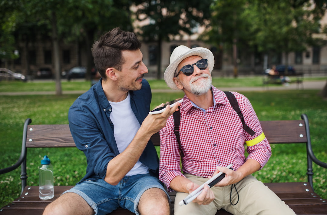 AR accessibility for sight loss - old man and young man